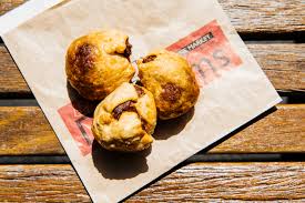 Hours, address, south melbourne market reviews: Jam Doughnuts Dim Sims And Shouting Butchers The Stories Behind The South Melbourne Market