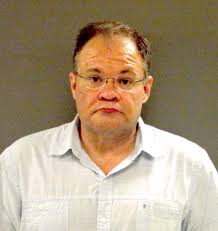 Former Car Dealer, Employee Face Fraud Charges