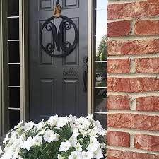 Complementing colors such as gray or other neutrals, it's a standout shade that's warm and welcoming. Urbane Bronze Paint Front Door Novocom Top