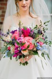 When you're considering wedding bouquet ideas, you have to think about budget and being realistic. Bright Color Wedding Bouquets Pink Purple Greenery Wedding Flowers J Foley Photogra Bright Wedding Colors Wedding Bouquets Pink Summer Wedding Bouquets