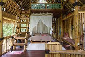 In Gianyar Sub District Id Jungle Bamboo House With Unique Design Located In The Embrace Of Nature On The River Bamboo House Design Bali House Bamboo House