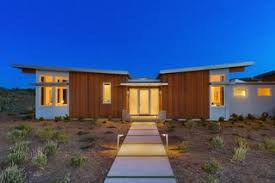This raised house plan offers the perfect vantage point to take in the views of the sparkling seashore, inviting light and landscape in through its glazed facades. Stillwater Dwellings Modern Prefab Homes Match Style With Sustainability Dwell