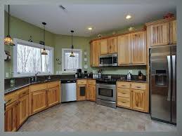 After removing the hardware, we recommend that the cabinets be thoroughly cleaned with a good cleaner degreaser to remove all grease and oils that normally buildup on kitchen cabinetry over time. Kitchen Paint Colors With Oak Cabinets And Stainless Steel Appliances And Grey Floor Bedroom Colour Schemes