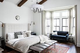 The humidity is certainly not from living near a body of water, but rather from the ridiculous amount of rain we've been. Master Bedroom With Vaulted Ceiling With Oak Wood Beams Transitional Bedroom
