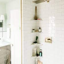 We love this idea as a folding makeup vanity, ironing board or any surface space that you don't need every day. 17 Small Bathroom Shelf Ideas
