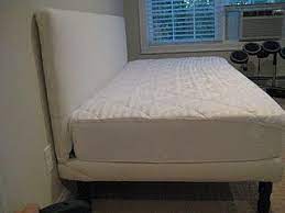 Modern reinterpretation of a classic with platform feet, with storage box also in the super. Diy Upholstered Daybed Basic Frame Cost A Little Over 100 To Build Interesting Use Of Painters Clo Diy Headboard Upholstered Diy Daybed Upholstered Daybed