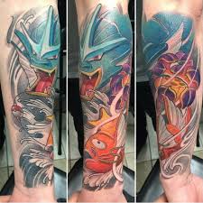The tattoo is not only a call out to the connection to a fish. Videogametatts Pokemonday 3 Magikarp Gyarados Tattoo By