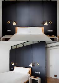 Black Bed Frame With Wood Headboard This Modern Apartment In Singapore Is Full Of Bold Blue And Black Modern Apartment Bedroom Interior Bedroom Headboard