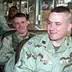 Captain (CPT) Steven G. Basso, USA, 7th Chemical Company Commander, and  First Lieutenant (1LT) Christopher W. Bricker, USA, (rear) have a laugh  before departing Fort Polk in support of Operation ENDURING FREEDOM -