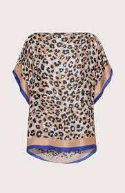 What's the best example of a group of seventy? Silk Poncho Blouse Col Grey Black Seventy
