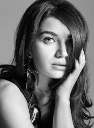 Eve Hewson Gets Her Closeup in Iris Covet Book