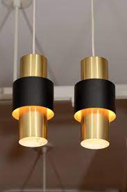They go great with our nostalgic light bulbs. Pair Of Danish Modern Cylindrical Brass Pendant Lamps At 1stdibs Brass Pendant Lamp Modern Light Fixtures Modern Lamp