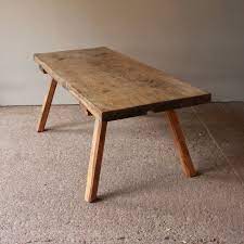 Rustic primitive coffee table with metal braces and forged iron. Primitive Butcher Block Coffee Table Coffee Table Tables
