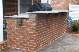 The kitchen elements are part of the belgard outdoor elements collection. Red Brick Outdoor Kitchen With A Raised Seating Bar Brick Outdoor Kitchen Outdoor Kitchen Bars Outdoor Kitchen