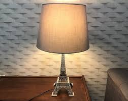 The eiffel tower has brightened the paris skyline since 1889 when 10,000 gas burners bathed the structure in light. Super Rare 58 Cm Tall Metallic Silver Eiffel Tower Lamp Furniture Home Living Lighting Fans On Carousell