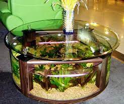 Aquarium yang telah jadi yang dijual biasanya dibanderol dengan harga mahal apalagi jika memiliki bentuk yang unik dan ikan hias yang cantik. Model Meja Ruang Tamu Aquarium Unik Desain Akuarium Aquarium Ide Dekorasi Rumah