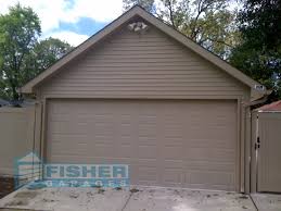 Is the location where you want to put your new log cabin garage too tight for our modular log garage? 2 Car Garage With High Pitch Gable Roof Fisher Garages