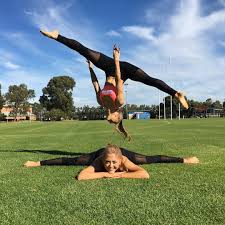 We each teamed up with a little person for the big sister vs little sister showdown. 400 Duo Yoga Poses Ideas Yoga Poses Couples Yoga Partner Yoga