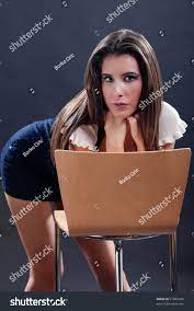 Attractive Young Woman Bending Over Chair Stock Photo 51803389 |  Shutterstock