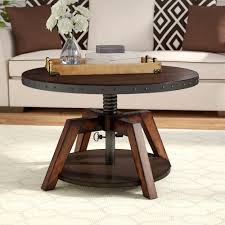 This accent table features a gray, marble table top that pairs beautifully with the dark, espresso table base finish. Espresso Wood Round Coffee Tables You Ll Love In 2021 Wayfair