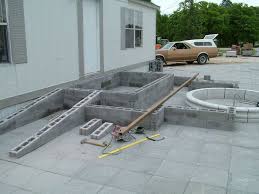 Pennsylvania stair lifts can install a vertical platform lift. Vobb Dry Stack Mortarless Porch Porch With Ramp Building A Deck Deck Building Plans