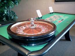 A Full Size Roulette Wheel And Table For You To Enjoy The Game Of Roulette Round And Round The Little Ball Goes Where It Roulette Wheel Roulette Casino Table