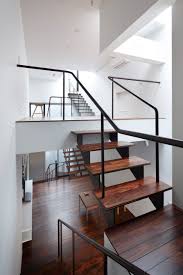 Multiple Open Staircases At Either End Of The Skinny House Connect These Split Level Floors Resulting In A S House Esherick House Interior Architecture Design