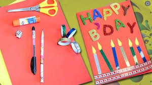 A scrapbook card is made with an assortment of decorations glued to nice paper. Happy Birthday Greeting Card Diy Birthday Card Easy Craft Youtube