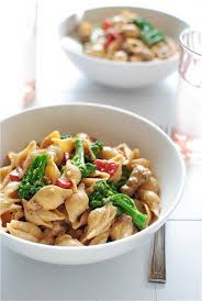 Stir in roasted bell pepper, chicken broth, heavy whipping cream and bring to a boil. Creamy Roasted Garlic Shells With Italian Sausage Peppers And Broccoli Bev Cooks Stuffed Peppers Pasta Dishes Italian Sausage