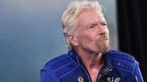 © andres leighton/ap virgin galactic founder richard branson waves good bye while heading to board the rocket plane that will fly him to space from spaceport america near truth or consequences, new mexico, july 11, 2021. Arvgx1wlsvn Rm