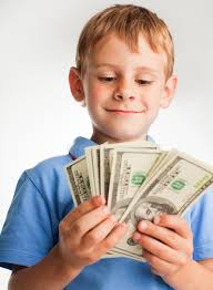 Boy Holding a Fan from Czech Crown Banknotes Stock Photo