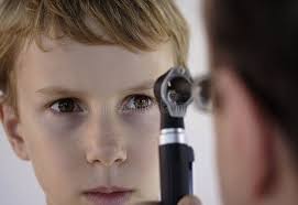 Look Into My Ey Image Of A Young Boy Undergoing An Examination By A Doctor Usin Affiliate Young Alternative Wedding Rings Royalty Free Stock Photos Image
