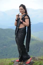 Actress Ester Noronha Hot And Stylish Pose In Black Saree With Goggles Baobua Bolly Baobua Com Saree photoshoot saree poses satin saree simple sarees saree trends. actress ester noronha hot and stylish
