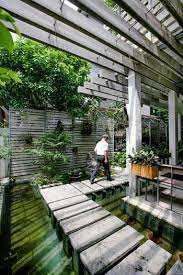 A Model Green Office In Vietnam Koiteich Patio Design Green Office Modern Pergola