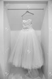 Groom wearing green tie on beach. Wedding Dress On A Hanger In Black And White Stock Photo Picture And Royalty Free Image Image 17990439