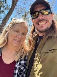 Threw up a tarp real quick last night as they were forecasting rain all  night. Lost a pound to bud rot last year so didn't want to take any  chances. Tiny plants