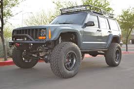 Don T Mind This Roof Rack And Light Bar Combo Jeep Cherokee Xj Jeep Cherokee Jeep Cherokee Sport