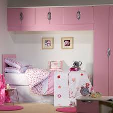 Overhead Storage And Side Wardrobe Highlights How You Can Make The Most Of Space Small Girls Bedrooms Childrens Bedroom Storage Kids Bedroom Storage Solutions