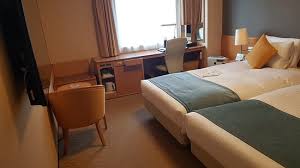 An improvised second level on a shelf. Twin Bed Room And There Is Small Gap Between Two Bed So Can Put Together And Make Them King Bed Picture Of Richmond Hotel Obihiro Ekimae Obihiro Tripadvisor
