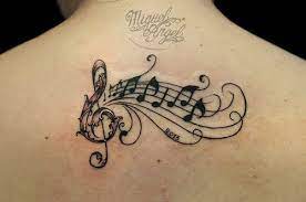 Musical notes tattoo a great tattoo design that has a creative music note. Musical Tattoo Music Tattoo Sleeves Music Tattoo Designs Note Tattoo