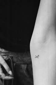 30 Amazing Airplane Tattoos For People Who Love To Travel Tattooblend Airplane Tattoos Tiny Tattoos Tattoos