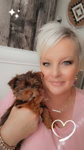 I can't believe today is Sadie Belle's 9th birthday. She didn't enjoy her  bath but she loves her new toy!!