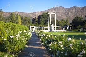 Shop with confidence on ebay! Pathway With White Flowers Leading To The Huguenot Monument In Summer With Green Grass And Blooming Gardens In Franschhoek Western Cape South Africa Shallow Dof Focus On Landmark Stock Photo Picture And
