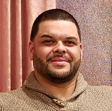 Should I paint or drywall over old wood paneling in my garage mancave?