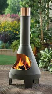 Image Result For Modern Outdoor Woodburning Firepit Toronto Modern Outdoor Fireplace Outdoor Fireplace Designs Outdoor Fire