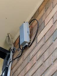 The dish was placed on the front peak of the roof because of the tree to the south east and the location of the cable box. Telstra Cable Lead In Grey Box Is Hanging From T Telstra Crowdsupport 777020