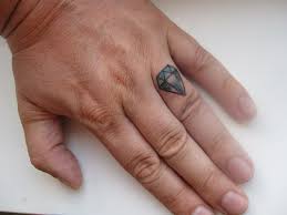 Instead of exchanging rings, pamela tattoed tommy onto her ring finger. 20 Beautiful Ring Finger Tattoo Designs Designcanyon