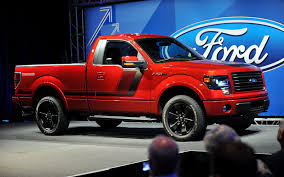 Orange ford single cab pickup truck, ford raptor, tree, mode of transportation. Ford F 150 Tremor Aimed At Street Truck Enthusiasts Wardsauto