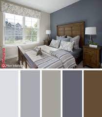 The blue bedside tables and ottoman adds a nautical look to the bedroom, giving it a pop of colour too. Balsam Place Apartments In Tewksbury Ma Interiordesign Design Bedroom Blue Brown Morr Interi Best Bedroom Colors Bedroom Color Schemes Bedroom Colors