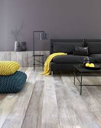 Yellow and gray living room features a gray corner reading chair adorned with a canary yellow pillow next to an emerald green accent table illuminated by a polished nickel. 41 Stylish Grey And Yellow Living Room Decor Ideas Digsdigs